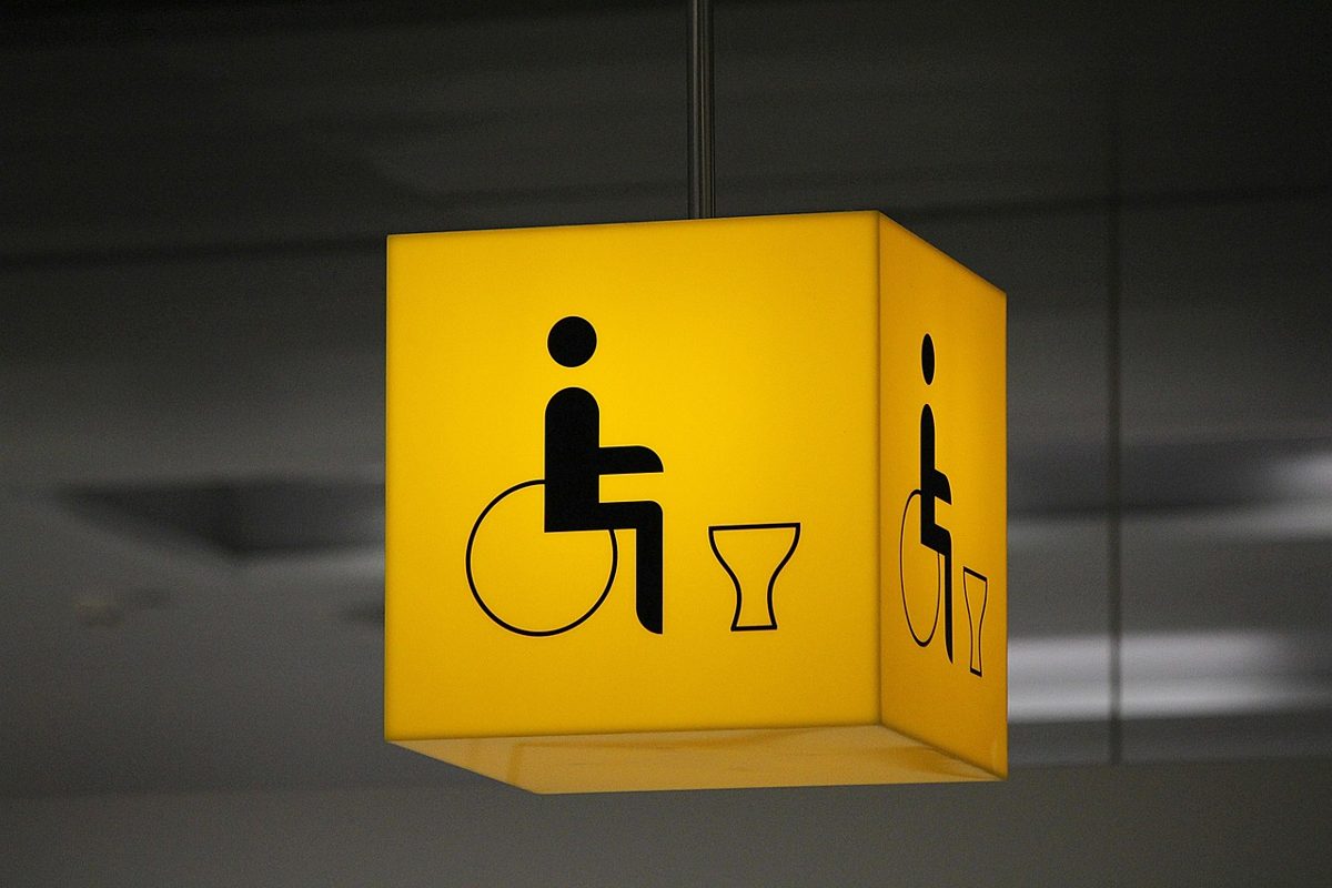Disabled washroom sign showing the wheelchair and WC symbol